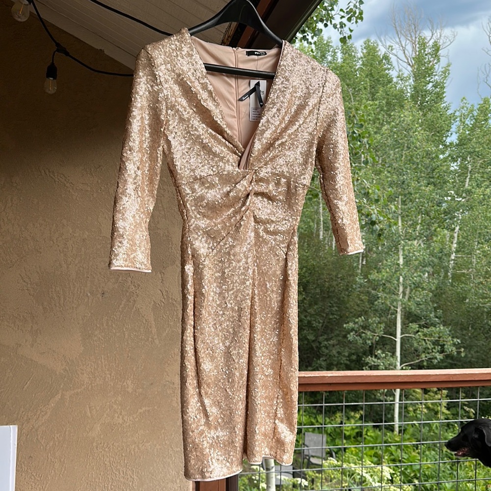 TNFC Dress Size Medium Is new with tags some sequins imperfections w/ purse